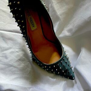 Denim spiked pumps